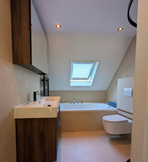 Nafoto van microcement in badkamer in Maarssen, Utrecht